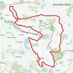 Mapa z zaznaczonym czerwonym szlakiem rowerowym, który biegnie przez tereny z nazwami miejscowości jak Łaziska, Karviná, Jastrzębie-Zdrój.