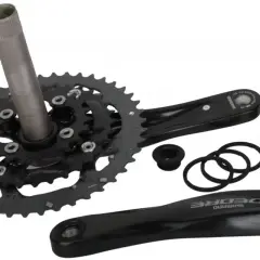 Zestaw rowerowy: korba Shimano Deore, suport i akcesoria.