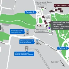 Mapa Kopalni Soli "Wieliczka" z zaznaczonymi wejściami na trasy, parkingami i kasami biletowymi.