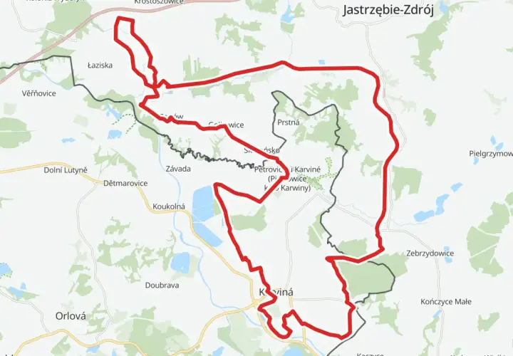 Mapa z zaznaczonym czerwonym szlakiem rowerowym, który biegnie przez tereny z nazwami miejscowości jak Łaziska, Karviná, Jastrzębie-Zdrój.
