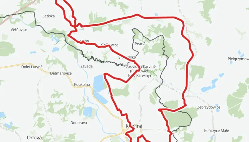 Mapa z zaznaczonym czerwonym szlakiem rowerowym, który biegnie przez tereny z nazwami miejscowości jak Łaziska, Karviná, Jastrzębie-Zdrój.