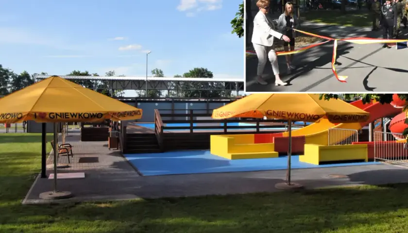Uroczyste otwarcie placu zabaw w Gniewkowie. Żółte parasole z napisem "Kocham Gniewkowo" i kolorowe zjeżdżalnie zapraszają do zabawy.